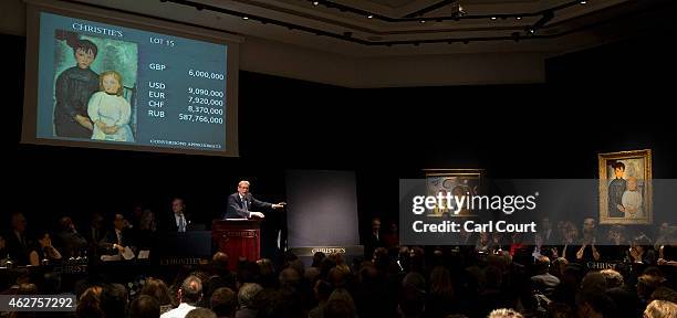 Auctioneer Jussi Pylkkanen takes bids for 'Les deux filles' by Amedeo Modigliani at Christies on February 04, 2015 in London, England. Forming part...