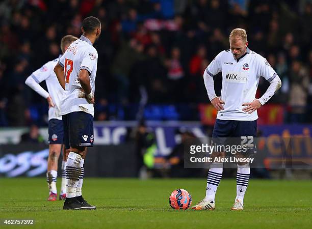 Dejected Liam Trotter and Eidur Gudjohnsen of Bolton Wanderers prepare to restart the game after conceding a second goal during the FA Cup Fourth...