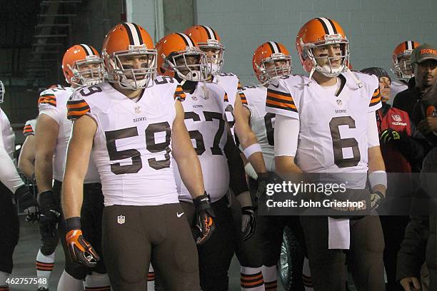 Brian Hoyer and Tank Carder of the Cleveland Browns prepare to take the field before their game against the Cincinnati Bengals at Paul Brown Stadium...