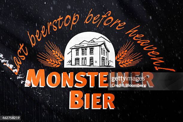 Logo sits on a sign outside the BierVision Monstein AG brewery in Monstein, near Davos, Switzerland, on Tuesday, Jan. 14, 2014. Next week the...