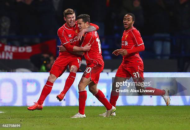 Philippe Coutinho of Liverpool celebrates scoring their second goal with Alberto Moreno and Raheem Sterling of Liverpool during the FA Cup Fourth...