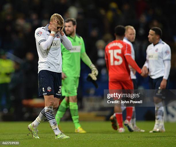 Dean Moxey of Bolton Wanderers shows his dejection during the FA Cup Fourth Round Replay match between Bolton Wanderers and Liverpool at Macron...