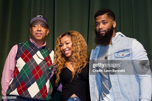 Russell Simmons, Simone Shepherd and King Keraun attend the RushCard Keep The Peace LA at Susan Miller Dorsey High School on February 4, 2015 in Los...
