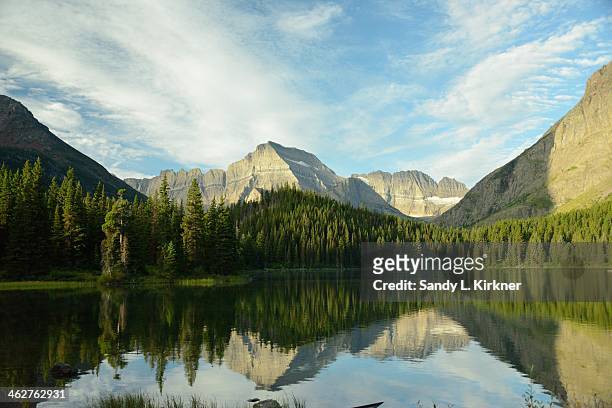 mountain reflections - grinnell lake bildbanksfoton och bilder