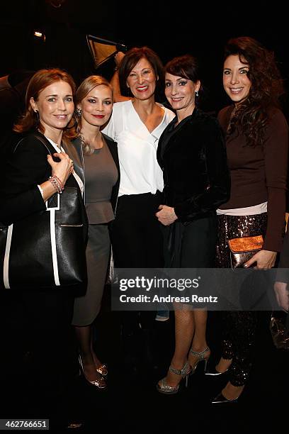 Tina Ruland, Regina Halmich, designer Eva Lutz, Anna Maria Kaufmann and Alexandra Polzin attend the Minx by Eva Lutz show during Mercedes-Benz...