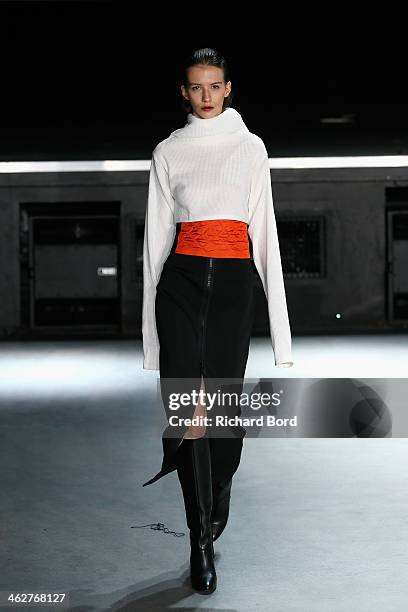 Model walks the runway during the 20/04 Hommes Menswear Fall/Winter 2014-2015 show as part of Paris Fashion Week on January 15, 2014 in Paris, France.