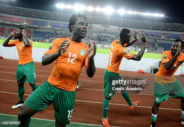 Ivory Coast's players celebrate after wining the 2015 African Cup of Nations semi-final football match against Democratic Republic of the Congo at...