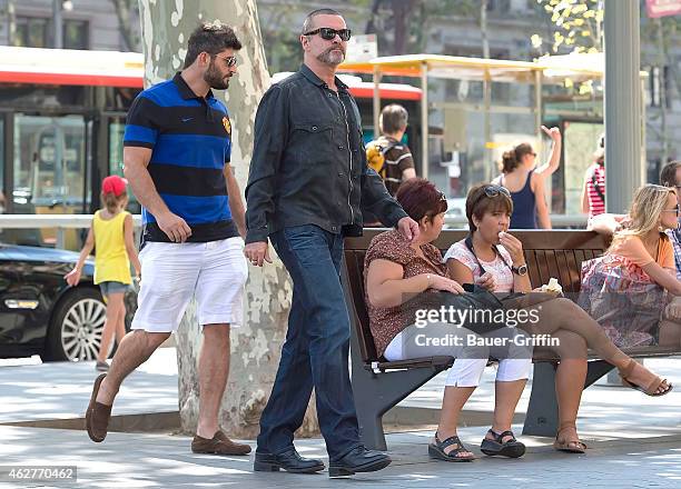 George Michael and his boyfriend Fadi Fawaz are seen on July 31, 2012 in Barcelona, Spain.