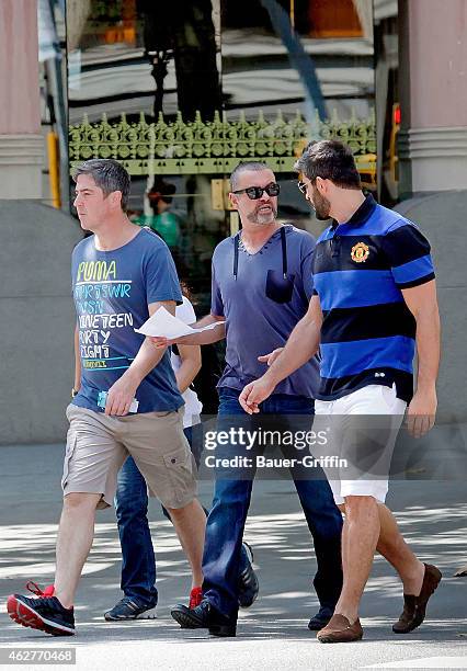 George Michael and his boyfriend Fadi Fawaz are seen on July 31, 2012 in Barcelona, Spain.