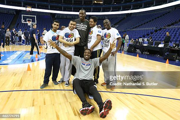 Tyshawn Taylor and Andray Blatche of the Brooklyn Nets poses for a photo during the NBA Cares Unified Basketball Clinic as part of the 2014 Global...