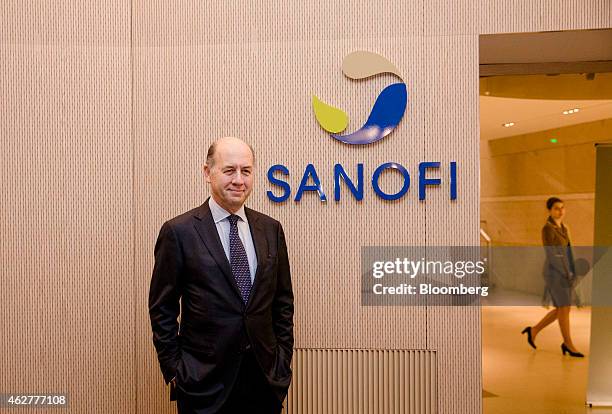 Serge Weinberg, chairman and interim chief executive officer of Sanofi, France's largest drugmaker, poses for a photograph before a news conference...
