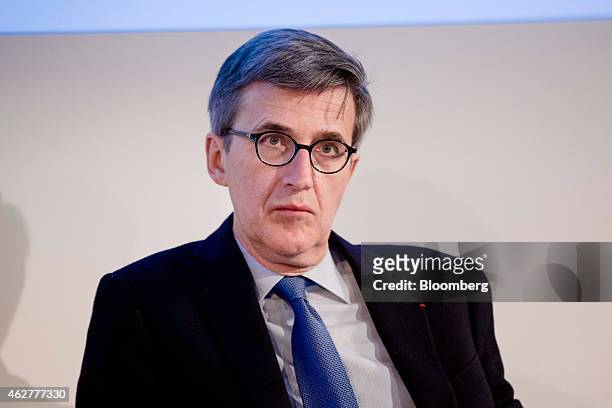Jerome Contamine, chief financial officer of Sanofi, France's largest drugmaker, attends a news conference to announce the company's quarterly...