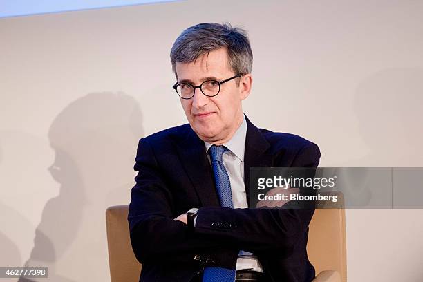Jerome Contamine, chief financial officer of Sanofi, France's largest drugmaker, looks on during a news conference to announce the company's...