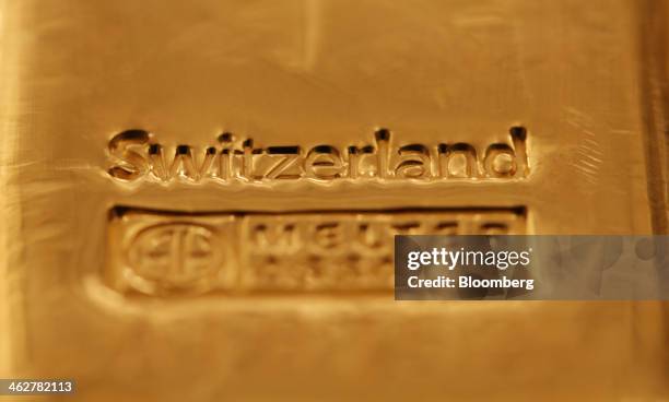 Swiss refined one kilogram gold bar is seen in this arranged photograph at Gold Investments Ltd. Bullion dealers in London, U.K., on Wednesday, Jan....