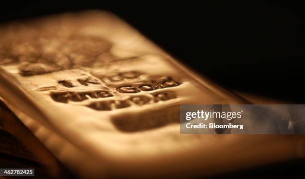 One kilogram gold bar is seen in this arranged photograph at Gold Investments Ltd. Bullion dealers in London, U.K., on Wednesday, Jan. 15, 2014. Gold...