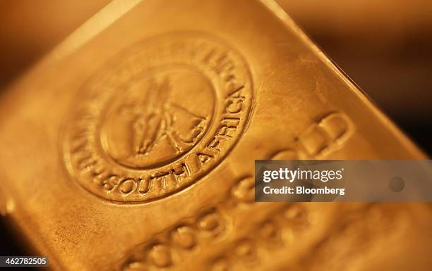 South African refined one kilogram gold bar is seen in this arranged photograph at Gold Investments Ltd. Bullion dealers in London, U.K., on...