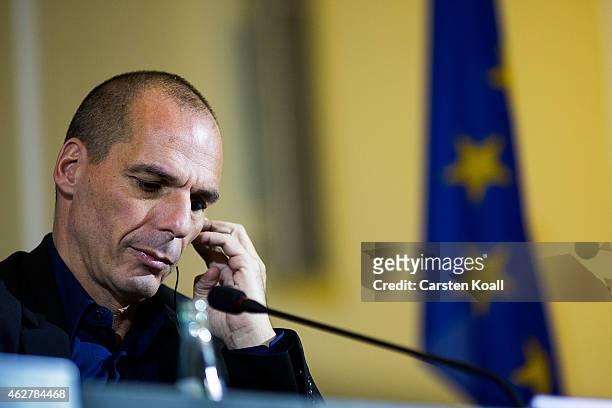 New Greek Finance Minister Yanis Varoufakis attends a press conference with German Finance Minister Wolfgang Schaeuble following talks on February 5,...