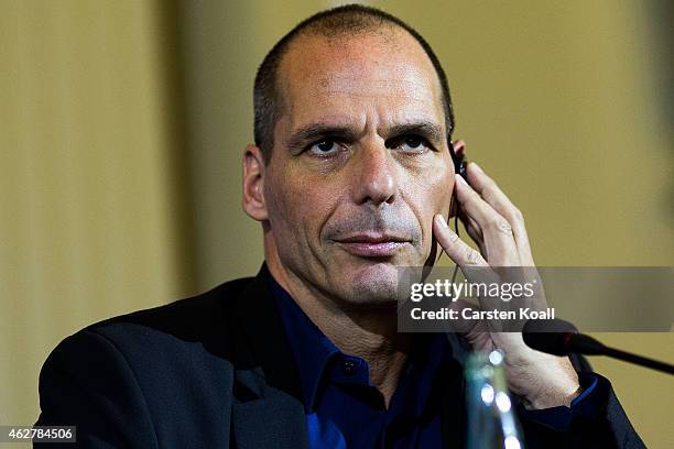 New Greek Finance Minister Yanis Varoufakis attends a pressconference with German Finance Minister Wolfgang Schaeuble following talks on February 5,...