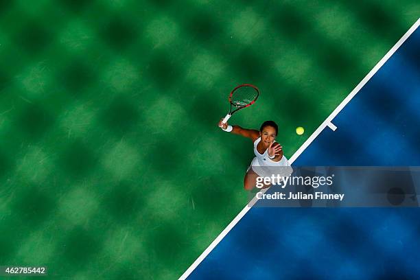 Heather Watson of Great Britain serves to Cagla Buyukakcay of Turkey during day two of the Fed Cup/Africa Group One tennis at Syma Event and Congress...