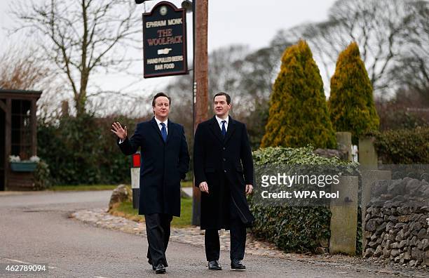 Chancellor Of The Exchequer George Osborne and Prime Minister David Cameron visit the set of television series Emmerdale on the Harewood Estate on...