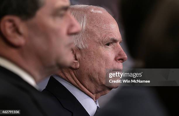 Sen. John McCain listens to questions during a press conference at the U.S. Capitol February 5, 2015 in Washington, DC. McCain and a group of...