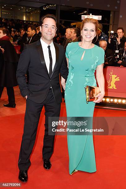 Actors Jan Josef Liefers and wife Anna Loos attend the 'Nobody Wants the Night' Opening Night premiere during the 65th Berlinale International Film...