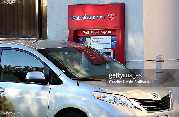 Bank of America customer uses an ATM at a bank branch on January 15, 2014 in Oakland, California. Bank of American beat analysts expectations and...