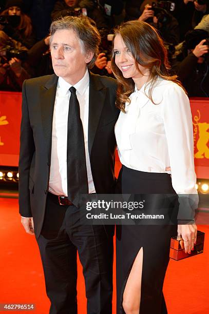 Gabriel Byrne and is wife Hannah Beth King attend the 'Nobody Wants the Night' premiere and Opening Ceremony of the 65th Berlinale International Film...