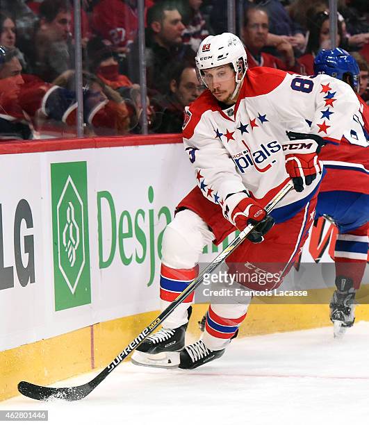 Jay Beagle of the Washington Capitals skates with the puck against the Montreal Canadiens in the NHL game at the Bell Centre on January 31, 2015 in...