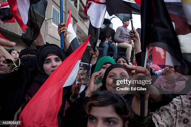 Supporters of Egyptian Defense Minister Abdel Fattah al-Sisi celebrate at the end of the second day of voting in Egypt's constitutional referendum in...