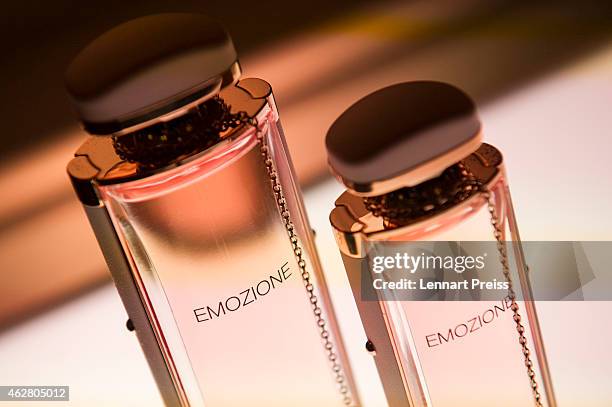 Bottles of the new Emozione fragrance of Salvatore Ferragamo are displayed during the Salvatore Ferragamo Emozione Fragrance Launch event at Residenz...