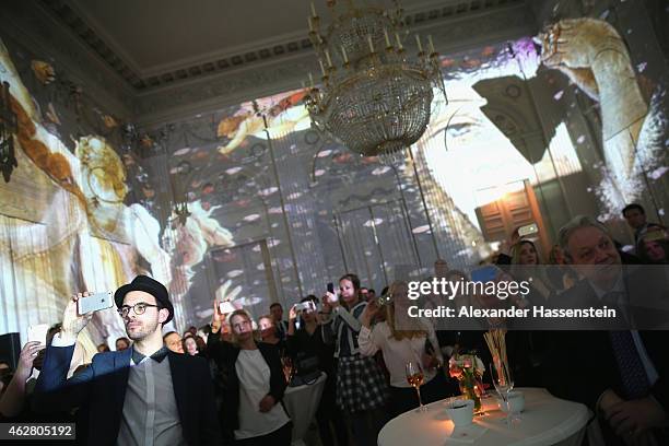 Guests enjoing the atmosphaere during the Salvatore Ferragamo Emozione Fragrance Launch event at Residenz on February 5, 2015 in Munich, Germany.