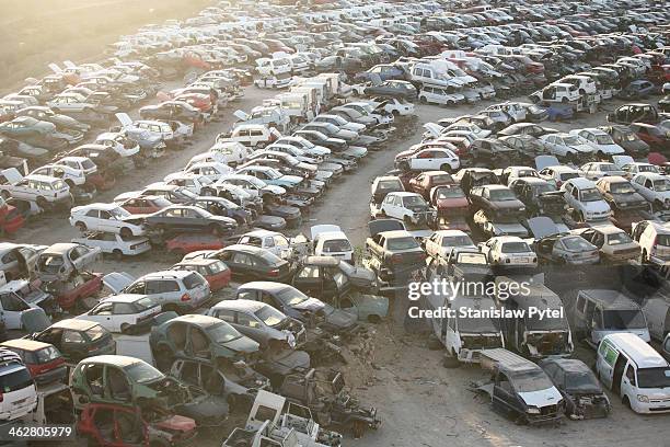 scrap-heap full of cars, top view, sunset - junkyard stock pictures, royalty-free photos & images