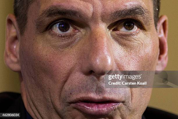 New Greek Finance Minister Yanis Varoufakis attends a press conference with German Finance Minister Wolfgang Schaeuble following talks on February 5,...