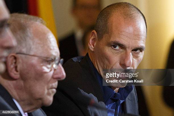 New Greek Finance Minister Yanis Varoufakis and German Finance Minister Wolfgang Schaeuble speak to the media following talks on February 5, 2015 in...