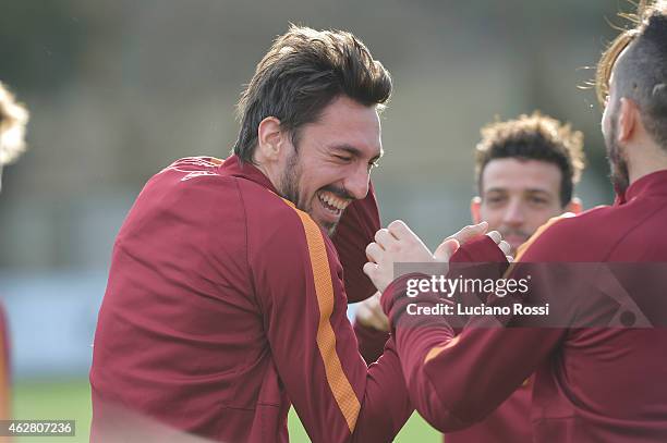 Davide Astori jokes during a trainig session at Centro Sportivo Fulvio Bernardini on January 23, 2015 in Rome, Italy.