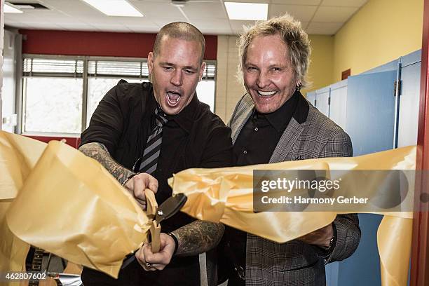 Matt Sorum and Carter Lay attend the Adopt the Arts Ribbon-Cutting Ceremony at Westminster Elementary School on February 5, 2015 in Venice,...