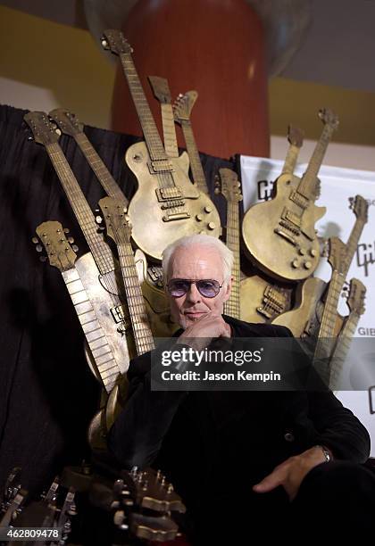 Musician Michael Des Barres poses backstage at The GRAMMYs Westwood One Radio Remotes during The 57th Annual GRAMMY Awards at Staples Center on...