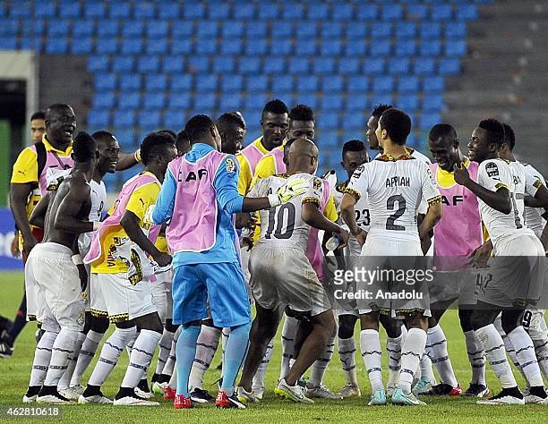 Ghana players celebrate after winning the 2015 African Cup of Nations semi-final football match against Equatorial Guinea at the Malabo Stadium on...