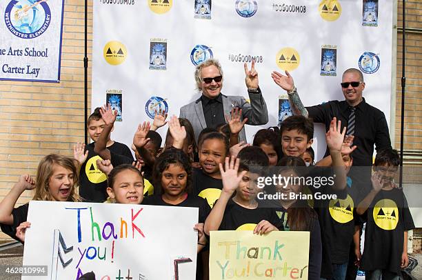 Matt Sorum and Carter Lay attend the Adopt the Arts Ribbon-Cutting Ceremony at Westminster Elementary School on February 5, 2015 in Venice,...