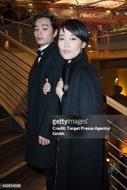 Rinko Kikuchio and her husband Shota Sometani attend the opening party during the 65th Berlinale International Film Festival at Berlinale Palace on...