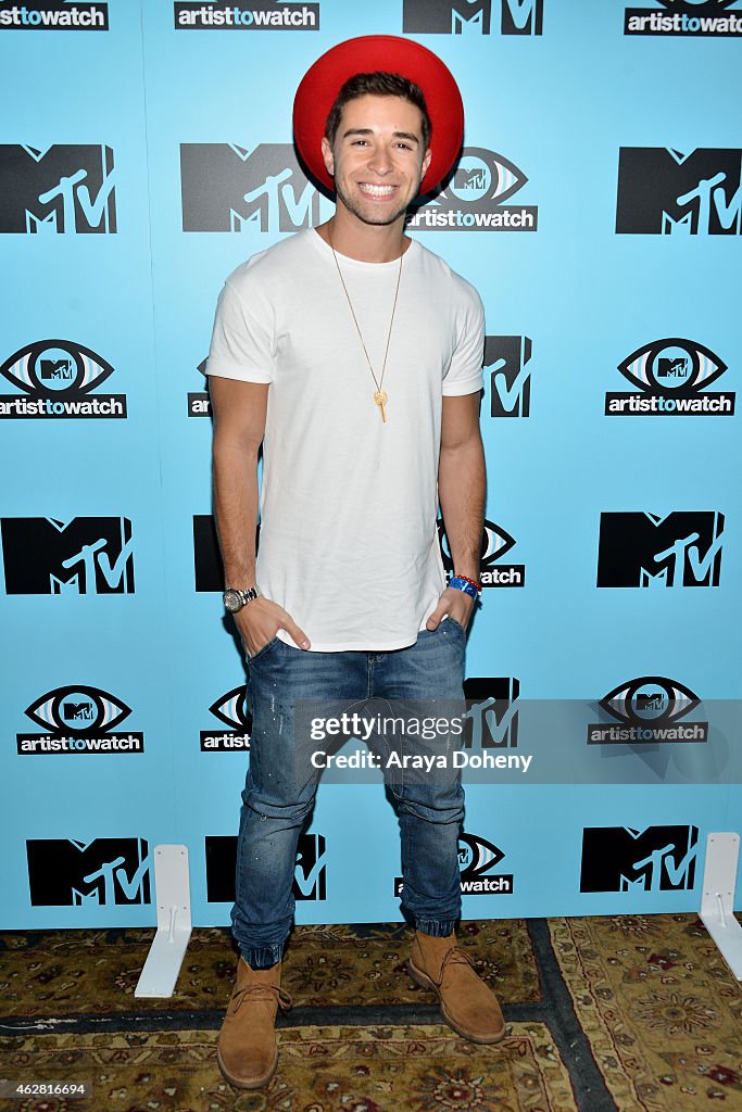 Jake Rappers Guest Rapper Jake Miller poses backstage during MTV Artists to Watch at ...