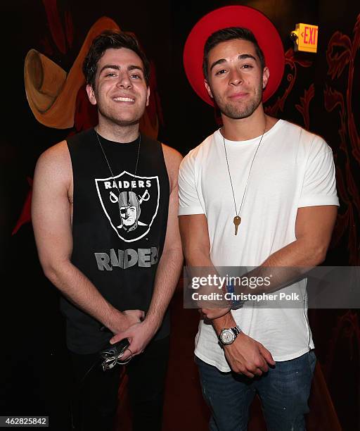 Rappers Hoodie Allen and Jake Miller pose backstage during MTV Artists to Watch at House of Blues Sunset Strip on February 5, 2015 in West Hollywood,...