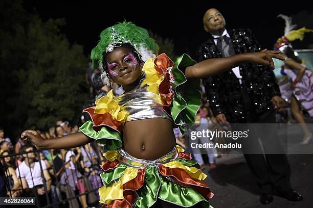 Dancers perform during the Montevideo Carnival 2015 parade on Isla de Flores avenue in Montevideo, Uruguay on February 5, 2015. World's longest...