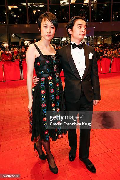 Rinko Kikuchi and her husband Shota Sometani attend the 'Nobody Wants the Night' premiere during the 65th Berlinale International Film Festival on...