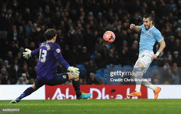 Alvaro Negredo of Manchester City scores the second goal past Simon Eastwood of Blackburn Rovers during the Budweiser FA Cup Third Round Replay match...