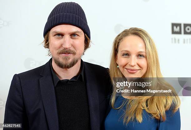 Actor Lars Eidinger and Petra Schmidt-Schaller attend the premiere of the film 'Der Clan. Die Geschichte der Familie Wagner' at Gloria Palast on...