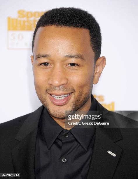 Singer John Legend arrives at the 50th Anniversary Celebration Of Sports Illustrated Swimsuit Issue at Dolby Theatre on January 14, 2014 in...