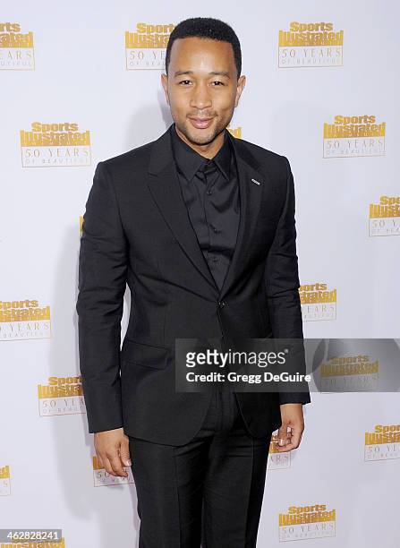 Singer John Legend arrives at the 50th Anniversary Celebration Of Sports Illustrated Swimsuit Issue at Dolby Theatre on January 14, 2014 in...