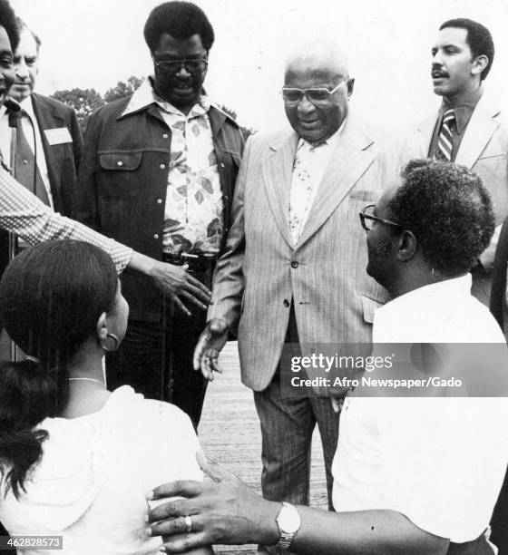 American religious leader and Civil Rights activist Reverend Martin Luther King Sr and Councilman Rick Taylor meets people at a Stand Up and Be...